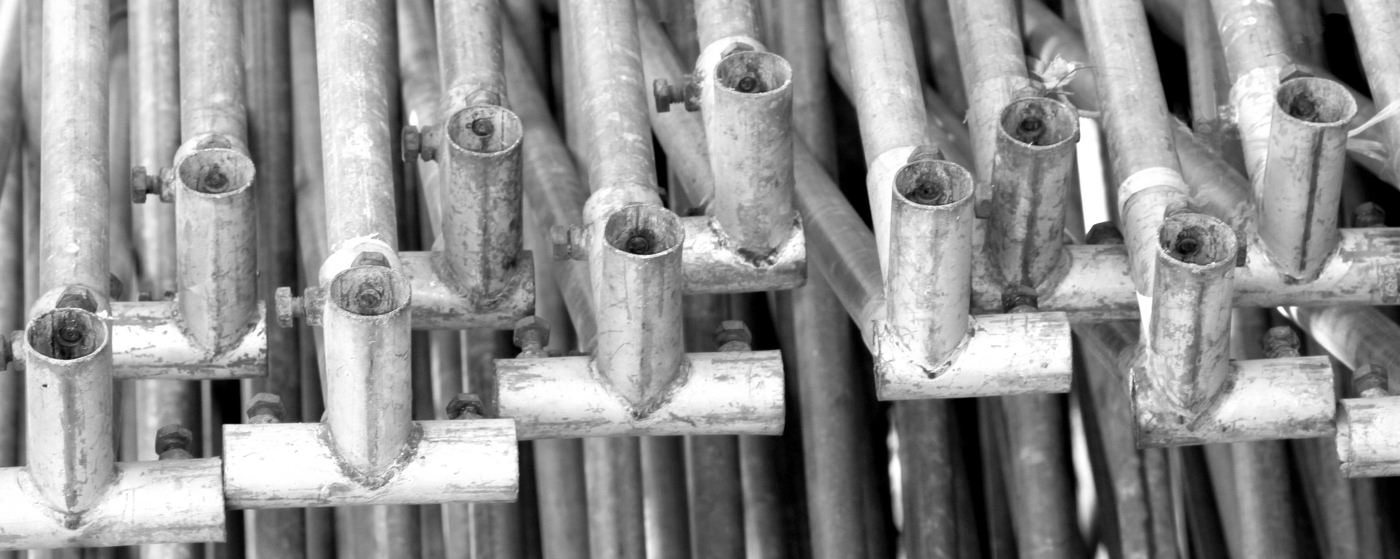 Steel scaffolding pipes being delivered